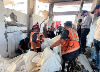8.000 Jasad Tertimbun di Gaza, Evakuasi Butuh Waktu Bertahun-tahun Palang Merah Internasional sedang mengevakuasi jenazah korban genosida di Jalur Gaza.